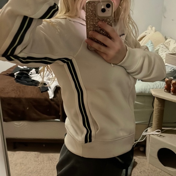 Cream/off-white Nike jacket w/ black and green stripe down the side - Picture 3 of 5